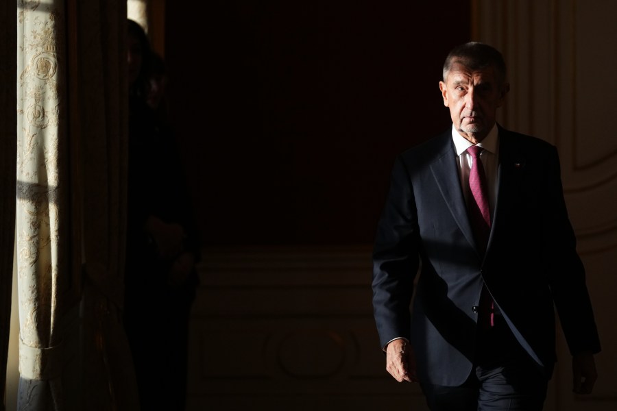 Leader of ANO 2011 political movement Andrej Babis arrives to be sworn in as the country's new prime minister at the Prague Castle in Prague, Czech Republic, Tuesday, Dec. 9, 2025. (AP Photo/Petr David Josek)
