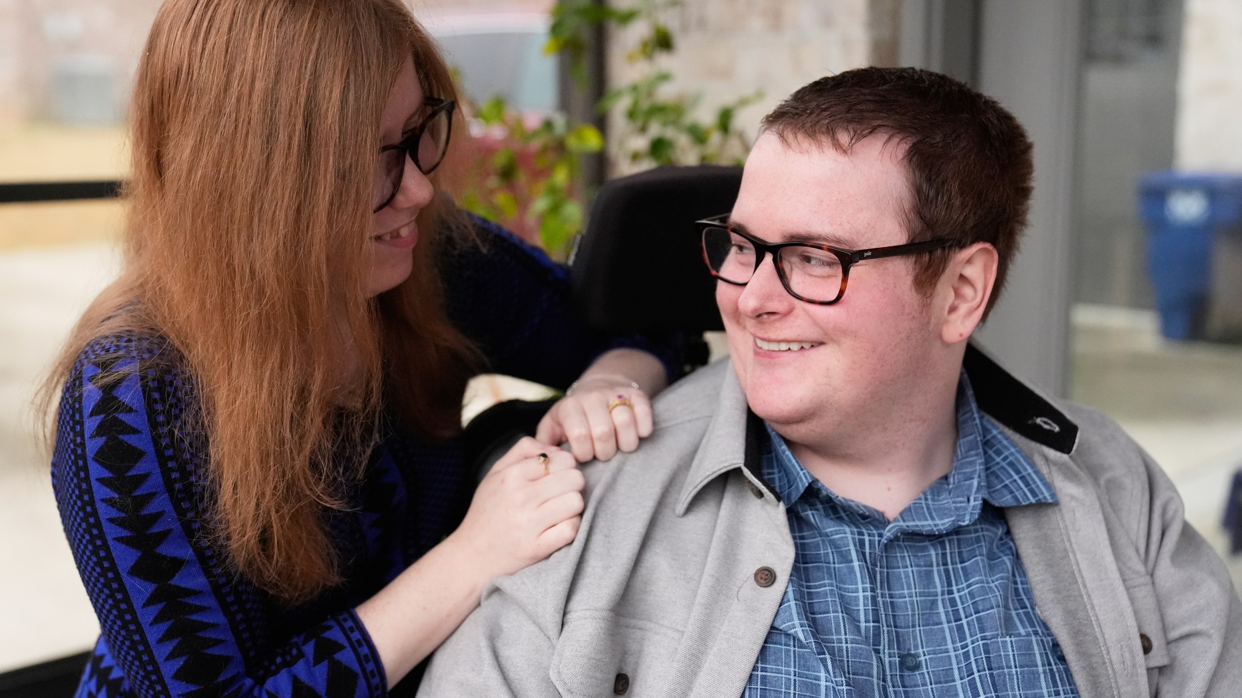Kaci LaFon, left, appears with her husband Collin LaFon at their home in Trussville, Ala., on on Friday, Nov. 21, 2025. (AP Photo/Brynn Anderson)