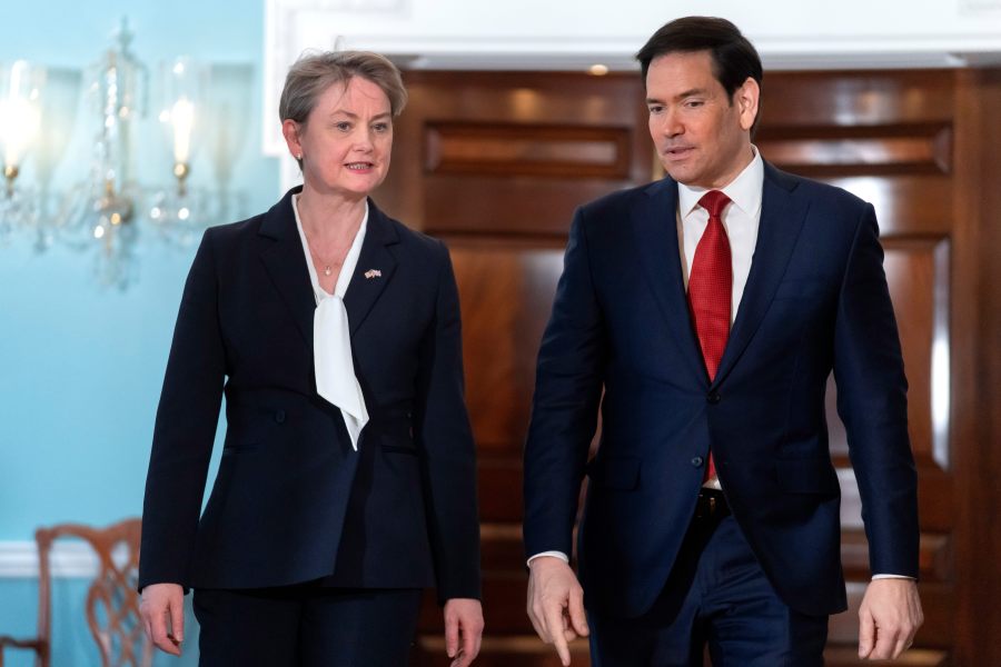 Secretary of State Marco Rubio, right, walks with Britain's Foreign Secretary Yvette Cooper at the State Department, Monday, Dec. 8, 2025, in Washington. (AP Photo/Mark Schiefelbein)