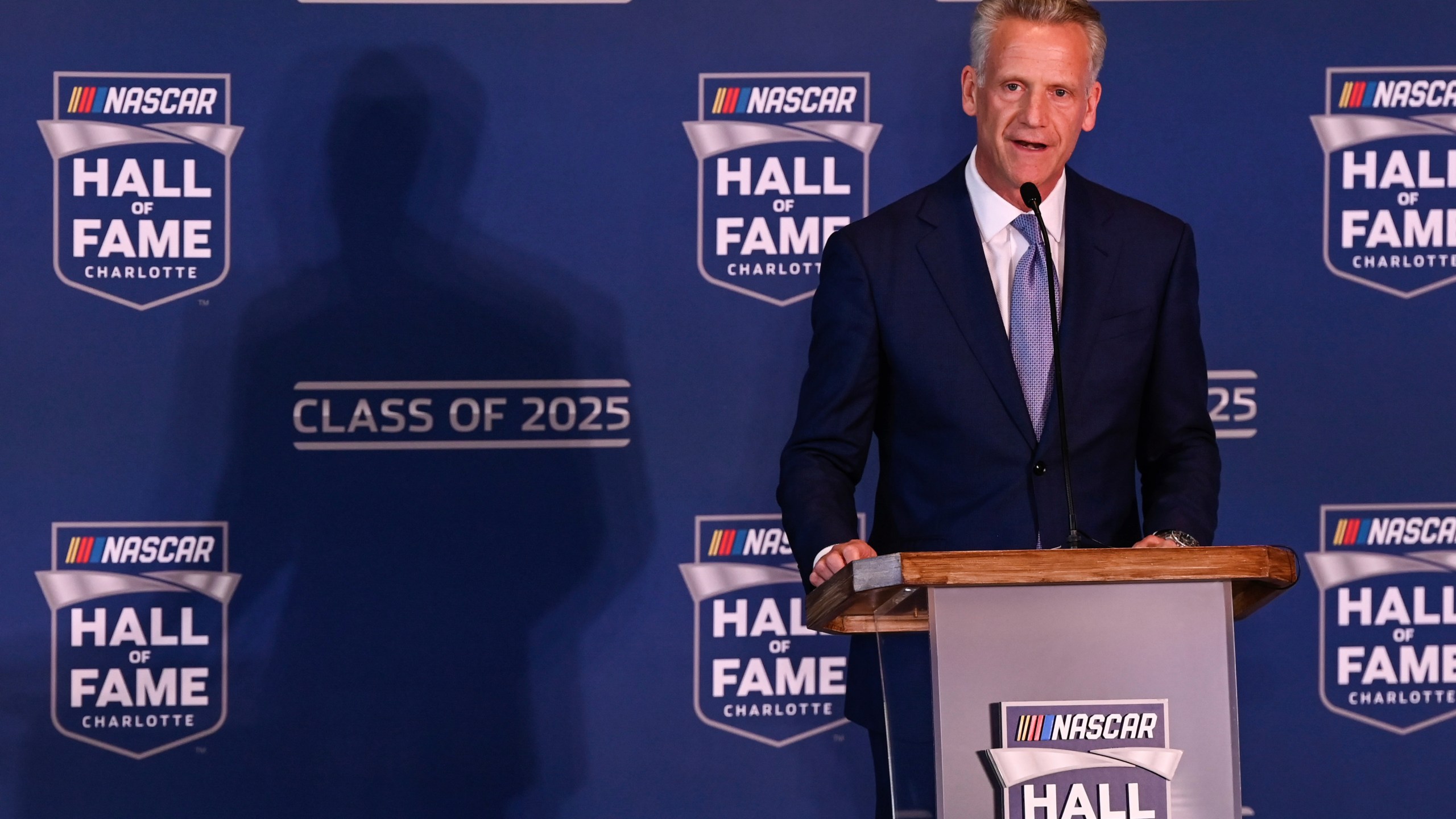 FILE - NASCAR president Steve Phelps announces the inductees to the 2025 NASCAR Hall of Fame class, Tuesday, May 21, 2024, in Charlotte, N.C. (AP Photo/Matt Kelley,File)