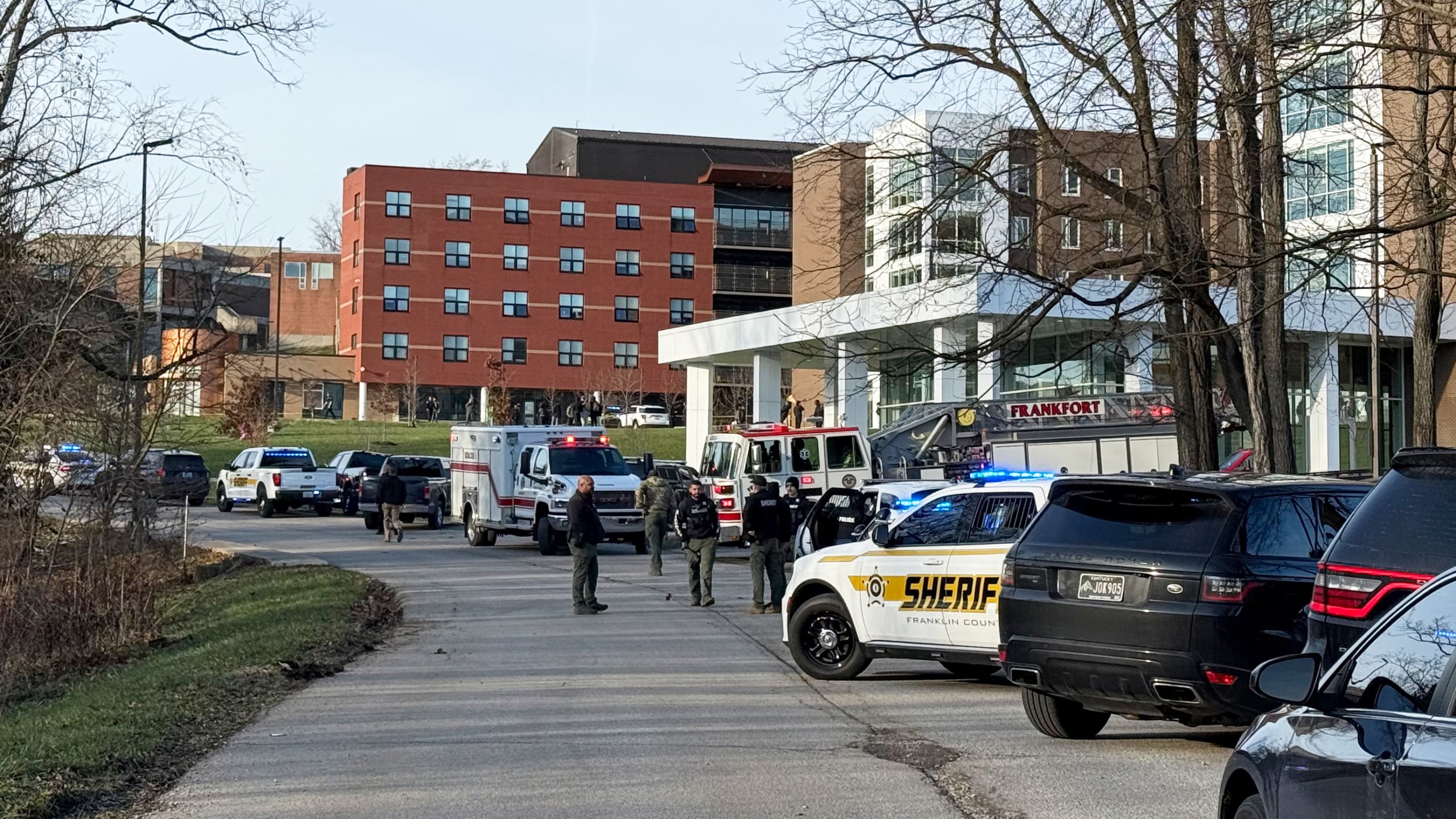 Law enforcement responds to a shooting at Whitney Moore Young Jr. Hall on Kentucky State University's campus in Frankfort, Ky., Tuesday, Dec. 9, 2025. (Hannah Brown/The State Journal via AP)
