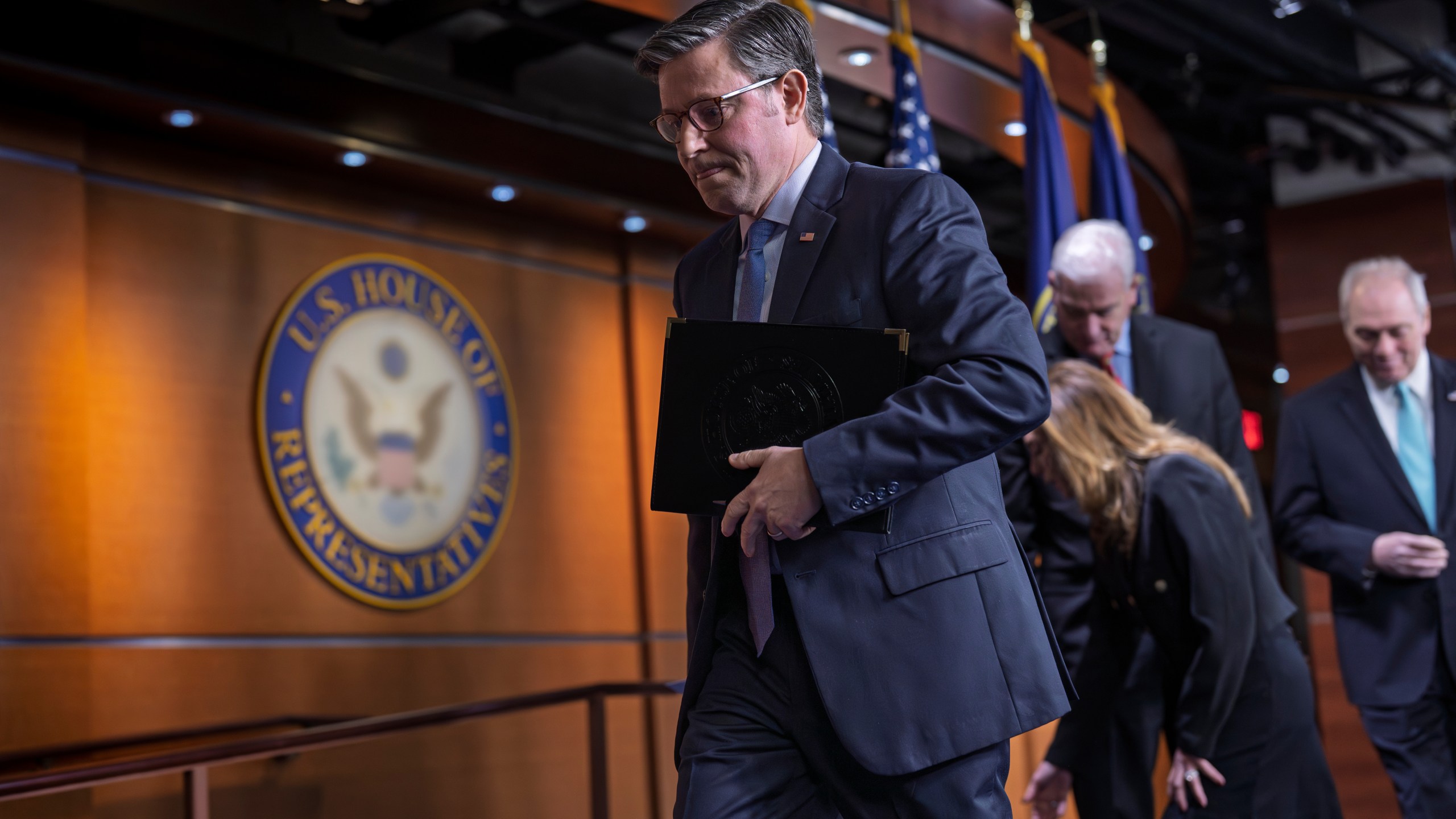Speaker of the House Mike Johnson, R-La., leaves a news conference as Republicans struggle with a plan to address growing health care costs, at the Capitol in Washington, Tuesday, Dec. 16, 2025. (AP Photo/J. Scott Applewhite)